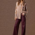 'DIONE' PAIR OF LEATHER-LOOK TROUSERS (BURGUNDY)